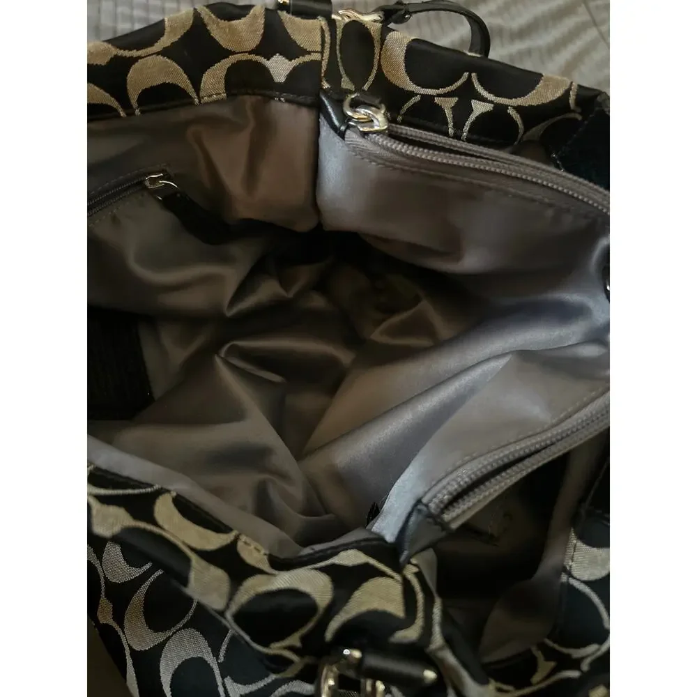 Coach Ashley Signature Canvas Handbag in Black and Gray.
